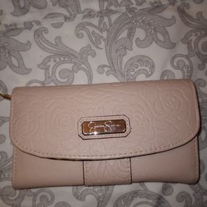 EUC faux leather, pink Jessica Simpson tri-fold wallet.